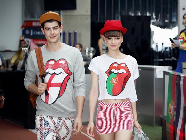 Couple walks in The Rolling Stone tees